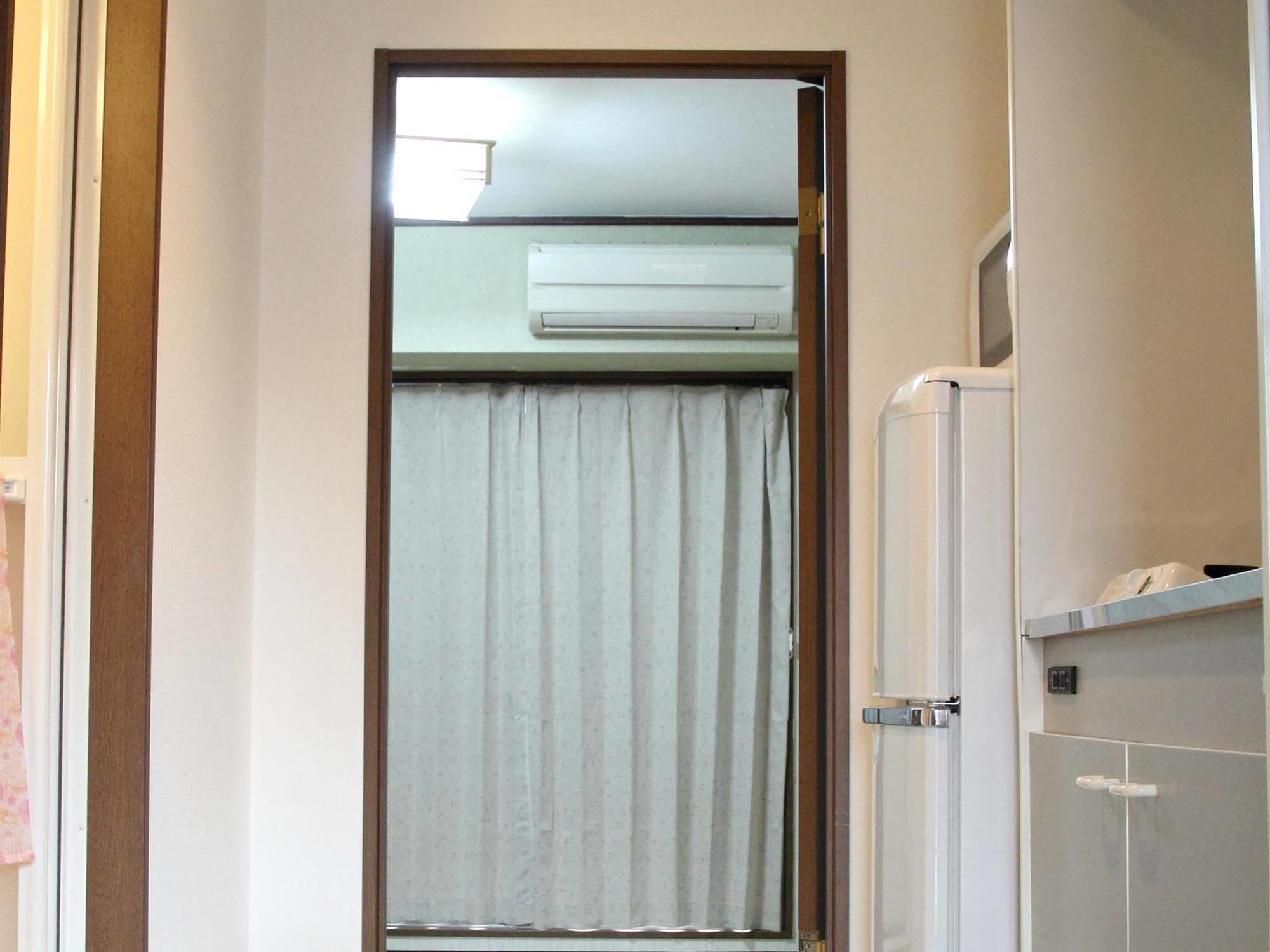 Sinsekai - Tourpalace Apartemen