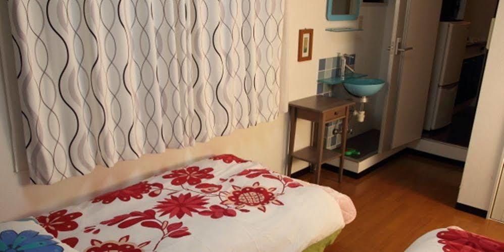 Sinsekai - Tourpalace Apartemen