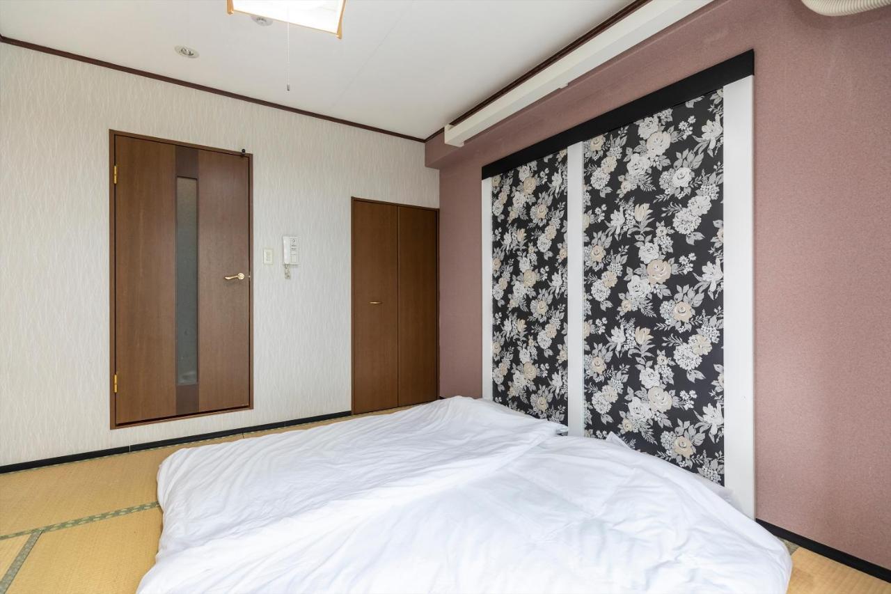 Sinsekai - Tourpalace Apartemen